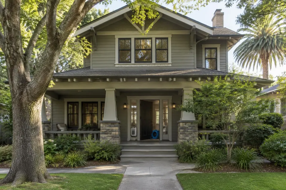 Generated illustration of a two-story Craftsman home with a deep porch and drying equipment inside the open door